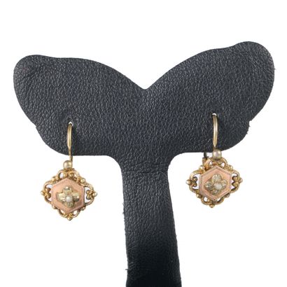 Pair of gold sleeper earrings set with small...