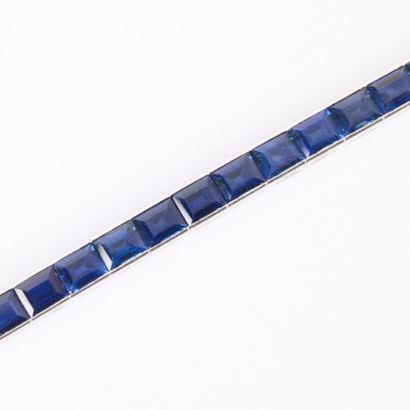 White gold rivière bracelet set with 34 calibrated...