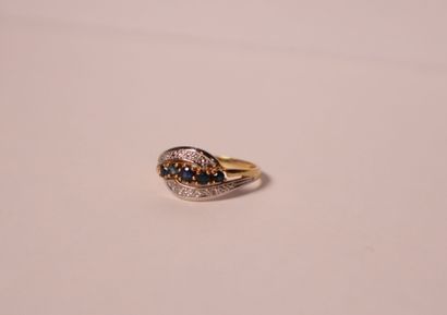 Yellow and white gold ring decorated with...