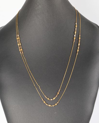Gold long necklace, the chain alternating...