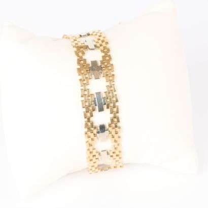 Two-tone gold band bracelet with geometric...