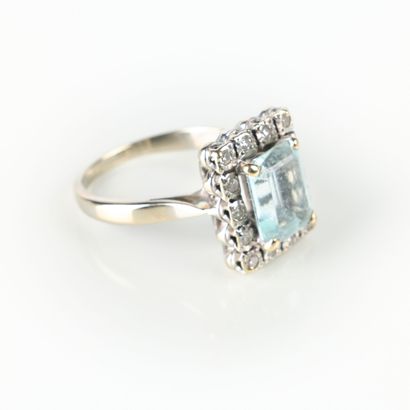 White gold ring set with a rectangular cut...