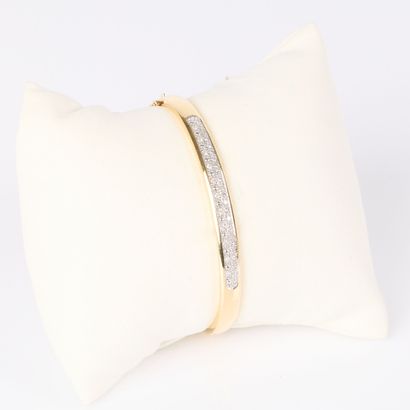 Gold band bracelet (750‰) partially paved...