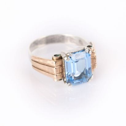 Silver and gold tank-type ring set with an...
