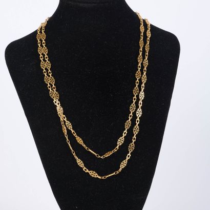 Openwork gold sautoir, forming a double-row...