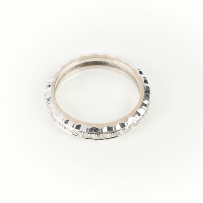 Wedding band in white gold set with small...