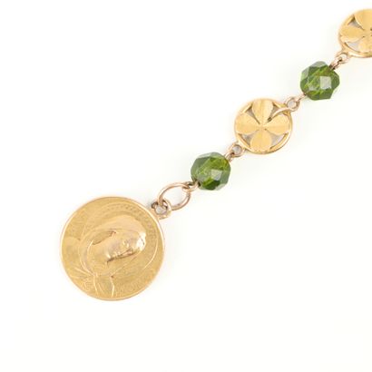 Gold rosary bracelet (750‰), adorned with...