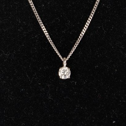 White gold necklace (750‰), gold chain gourmette...
