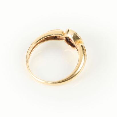 Gold ring set with an oval ruby (worn) with...