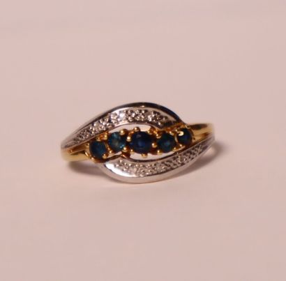 Yellow and white gold ring decorated with...