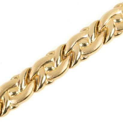 Fancy matte and polished gold link bracelet....
