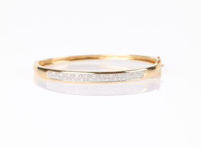 Gold band bracelet (750‰) partially paved...