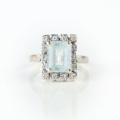 White gold ring set with a rectangular cut...