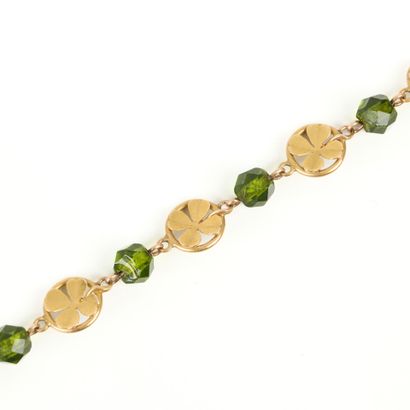 Gold rosary bracelet (750‰), adorned with...