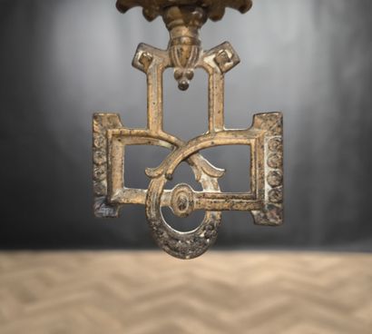 Curious metal suspension decorated with skiers,...