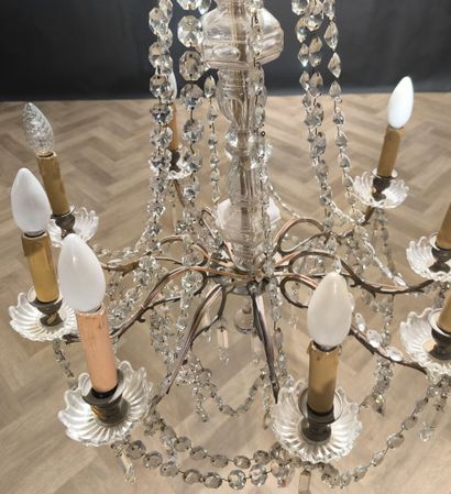 8-light gilded metal chandelier with glass...