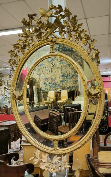 Large oval mirror with glazing beads and...