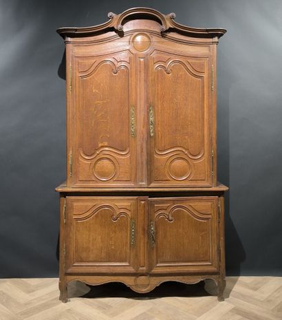 Two-body buffet in carved and molded oak....