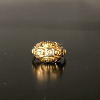 Gold ring set with a white stone. Circa 1940-50....