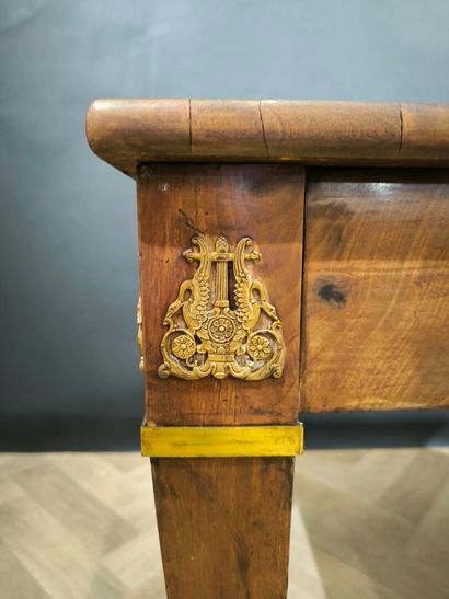Veneered desk, opening with three belted...