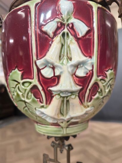 Curious metal suspension decorated with skiers,...