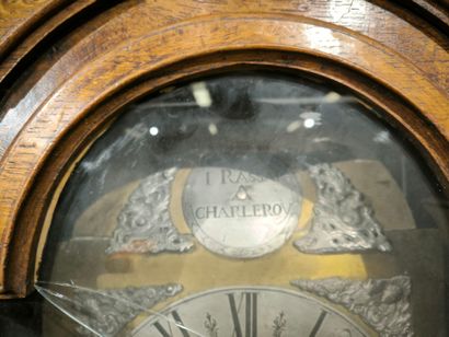 Oak parquet clock with carved flower decoration,...
