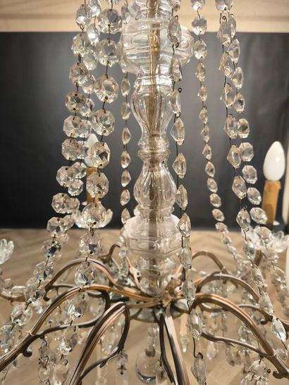 8-light gilded metal chandelier with glass...