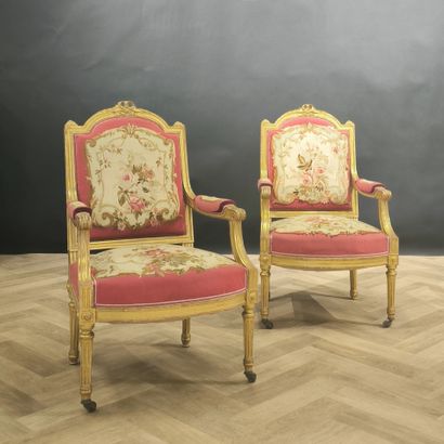 Pair of gilded wood armchairs, ribbon decoration,...