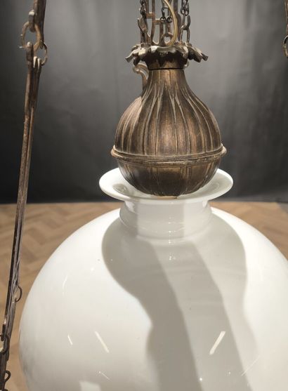 Curious metal suspension decorated with skiers,...