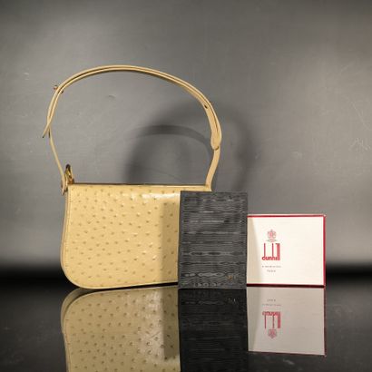 LANCEL. Beige ostrich-style leather handbag...