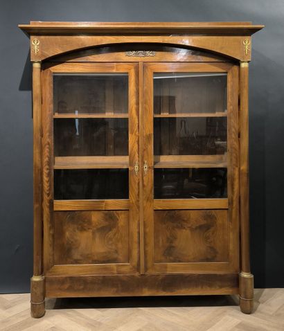 Mahogany and mahogany veneer bookcase opening...