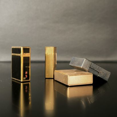 S.T. DUPONT. 4 lighters: gold plated with...