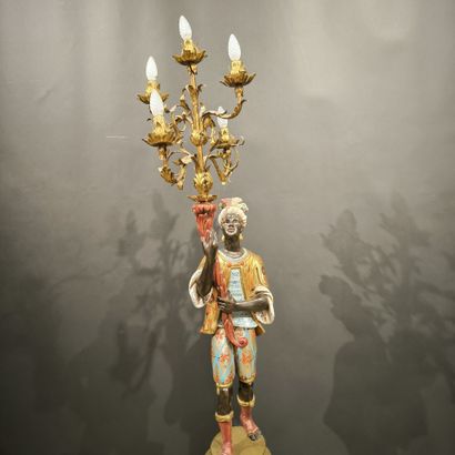 Nubian torch-holder in lacquered and gilded...