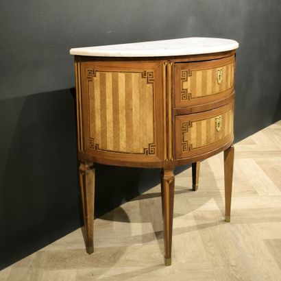 . Small inlaid half-moon chest of drawers,...