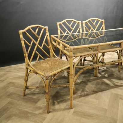 Rattan table and 4 chairs. Circa 1970-80....