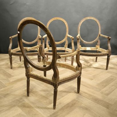 . Suite of 4 natural wood armchair frames,...