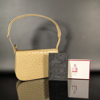 LANCEL. Beige ostrich-style leather handbag...