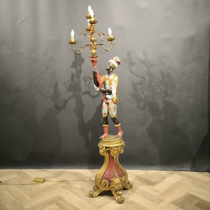 Nubian torch-holder in lacquered and gilded...