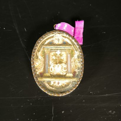 Metal reliquary medallion containing the...