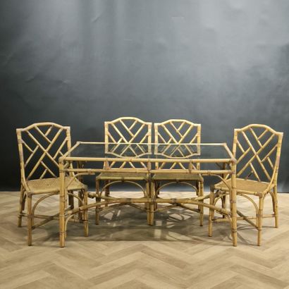 Rattan table and 4 chairs. Circa 1970-80....