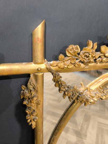 Wood and gilded stucco glazed mirror, decorated...