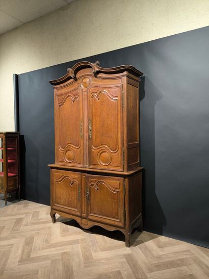 Two-body buffet in carved and molded oak....