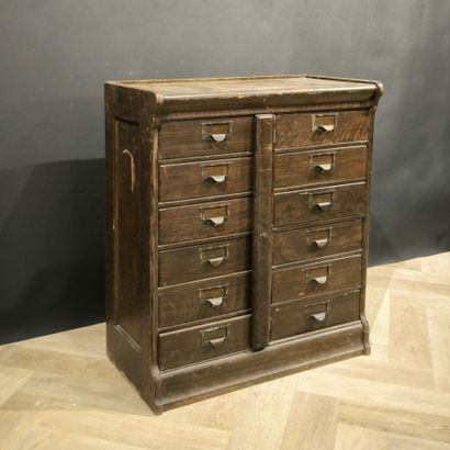 Small mail cabinet opening with 12 drawers...