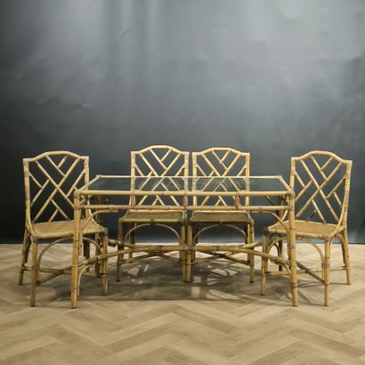 Rattan table and 4 chairs. Circa 1970-80....