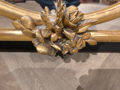 Wood and gilded stucco glazed mirror, decorated...