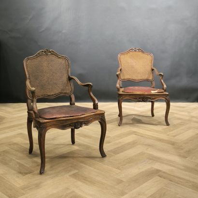 Pair of armchairs in carved wood with fleururette...
