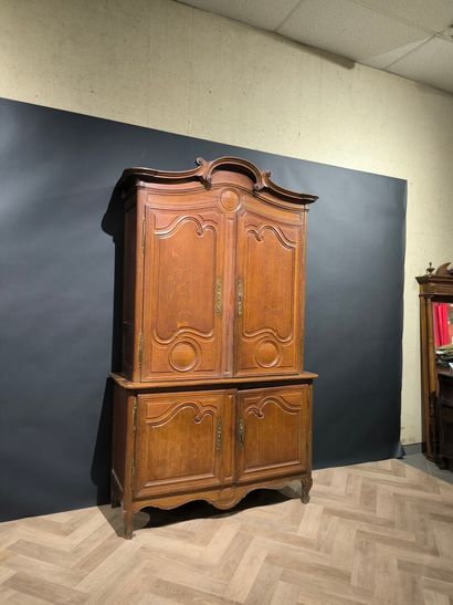 Two-body buffet in carved and molded oak....