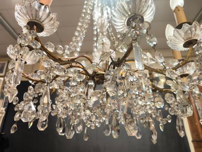 8-light gilded metal chandelier with glass...