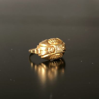 Gold ring set with a white stone. Circa 1940-50....