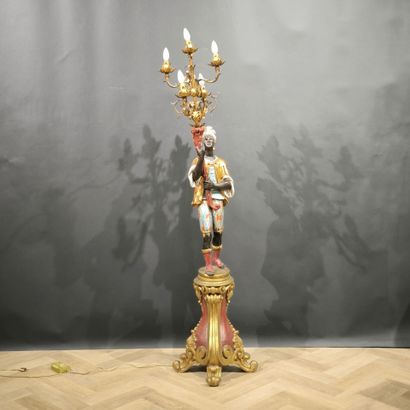 Nubian torch-holder in lacquered and gilded...